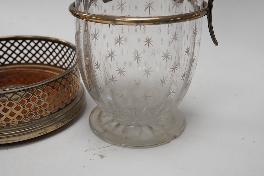 A late Victorian silver mounted glass claret jug, Maxfield, & Sons, London, 1898, 28.6cm, (chip to foot), together with a modern silver mounted wine coaster. Condition - poor to fair